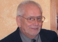 Joseph E.  Olivan